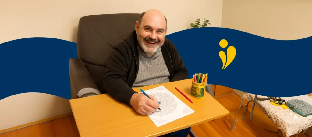 NDIS participant doing art therapy to make the most of his funding for core supports